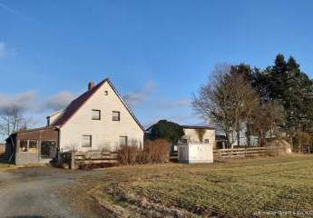 Einfamilienhaus mit Garage, Scheune und Landwirtschaftlicher Fläche