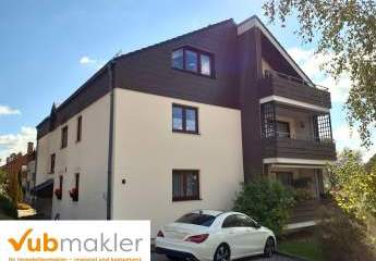 Charmante Dachgeschosswohnung mit offenem Wohnkonzept, sonnigem Balkon und Garage