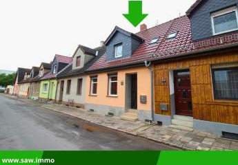 Ohne Käuferprovision! Teilsaniertes Reihenhaus mit Garage und Garten