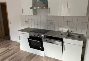 Gemütliche 1,5-Zimmer mit Laminat, EBK und Hausgarten in guter Lage!!!