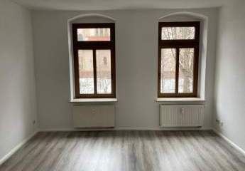 Gemütliche 3-Zimmer mit Laminat, Balkon und Wannenbad in zentraler Lage!