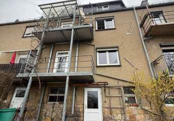 Günstiges Reihenmittelh. mit Ausblick, 2 Blk. und sonnigem Grundstück in Toplage zum Fertigstellen