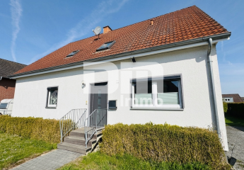 Charmantes Ein- bis Zweifamilienhaus mit großem Garten in begehrter Lage