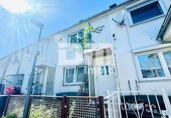 Kompaktes Reihenhaus in exponierter Lage mit Garten