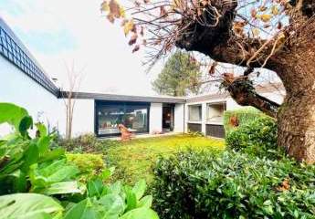Großzügiger Reihenend-Bungalow in L-Form mit Garage und sonnigem Garten in MA-Vogelstang