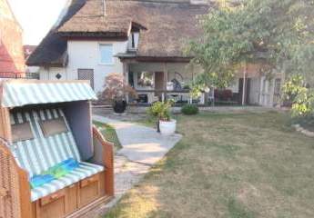 Idyllisches Reetdachhaus mit Ferienwohnung