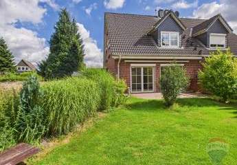 Familienidyll: Moderne Doppelhaushälfte mit Garten & Kamin in Toplage