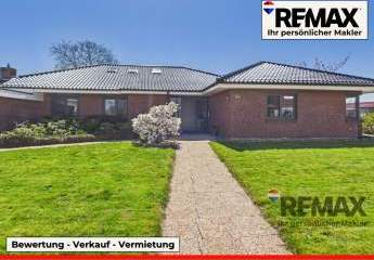 Modernisierter Bungalow mit kleiner Gewerbeeinheit in belebter Lage