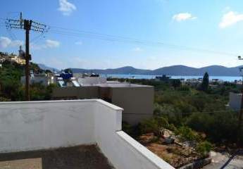 Kreta, Elounda: Unfertiges, 3-stöckiges Gebäude mit Meerblick im Zentrum zu verkaufen