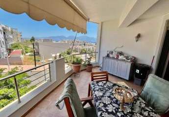 MIT VIDEO! Kreta, Agios Nikolaos: Geräumige Wohnung im 2. Stock mit Panoramablick auf das Meer zu verkaufen