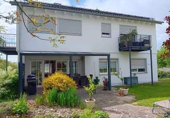 Ihr neues Zuhause- Helle Gartenwohnung mit großer Sonnenterrasse und Teich-