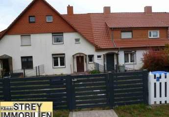 Reihenmittelhaus mit drei Garagen und attraktiven Grundstück in gefragter Lage