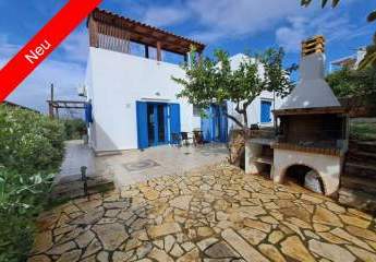 Mediterraner Wohntraum auf Kreta in Plaka: Freistehender Bungalow mit Meerblick & Dachterrasse