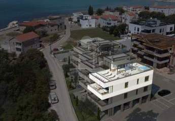 Penthouse im 2. OG mit 79 m² Dachterrasse, Panorama-Meerblick und privater Garage