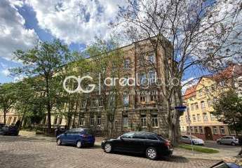 Teilsaniertes Mehrfamilienhaus in markanter Ecklage in der südlichen Innenstadt