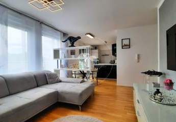 Modernes Wohnen mit Stil – 4-Zimmer-Wohnung  mit Balkon in energieeffizientem KfW-55-Neubau