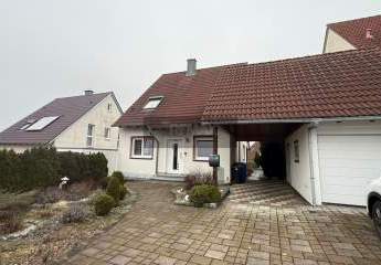 Stilvolles Familienidyll mit Wellnessfaktor und lichtdurchflutetem Wohnambiente