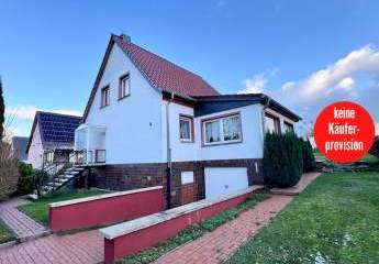 HORN IMMOBILIEN++ Burg Stargard, Einfamilienhaus mit Garage und geschlossener Veranda, Randlage