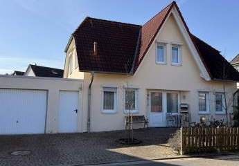 Einfamilienhaus mit großer Garage in ruhiger Lage