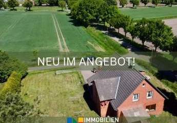 Zweifamilienhaus mit Anbau und Vermietungspotenzial auf weitläufigem Grundstück