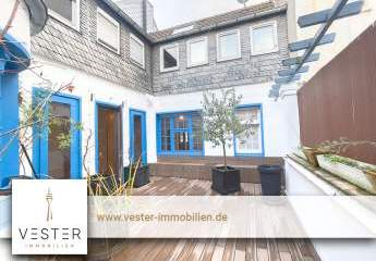 Sanierte Wohnung mit Parkett, EBK und großer Außenterrasse & Glasfaseranschluss in zentraler Lage