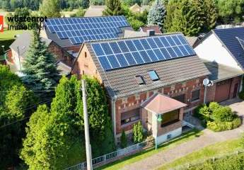Wohnoase mit Einliegerwohnung und Pferdehof. Rentable Einnahmen von ca. 1000 EUR mtl. durch PV-Anlage!