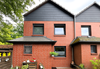Gemütliches Reihenendhaus mit Gartenidylle und Kamin in Glinde