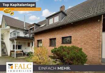 Ein Haus – viele Wege: Mehrfamilienhaus mit Garten, guten Mieterträgen und Ausbauchancen in Spich