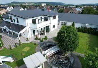 Mehrfamilienhaus mir Gewerbeeinheit