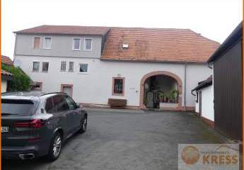 Reserviert!!! Wohnhaus mit 4 Wohneinheiten, 3 Garagen sowie diversen Nebengebäude in SLÜ-Gundhelm