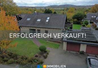 Wohnen mit Komfort und Freiraum – charmantes Zweifamilienhaus in gepflegter Lage