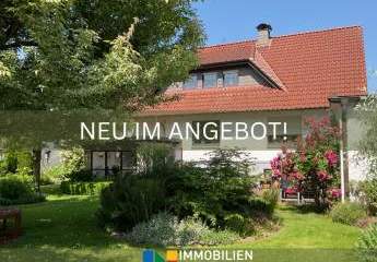 Naturnah & exklusiv: Ein- bis Zweifamilienhaus mit weitläufigem Gartenparadies