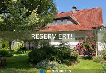 Naturnah & exklusiv: Ein- bis Zweifamilienhaus mit weitläufigem Gartenparadies