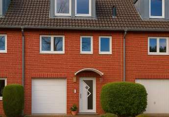 „Zuhause ist kein Ort, sondern ein Gefühl – stilvolles Reihenmittelhaus mit Garten“