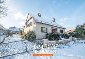 Hochwertiges Architekten-Ein-/Zweifamilienhaus mit Garten und Garagen - TOP-Wohnen in Rollshausen!