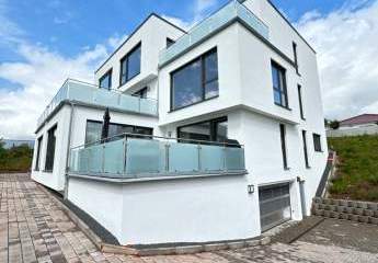 Neuwertiges Penthouse mit EBK + 3 Stellplätzen in Energie-Effizienzhaus