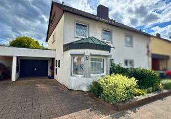 Einfamilienhaus mit Wintergarten, Garage + parkähnlichem Garten