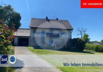 GELEGENHEIT:
VERMIETETES ÄLTERES EIN-ZWEIFAMILIENHAUS 
IN TRAUMHAFTER AUSSICHTS/RANDLAGE