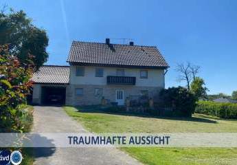 GELEGENHEIT:
VERMIETETES ÄLTERES EIN-ZWEIFAMILIENHAUS 
IN TRAUMHAFTER AUSSICHTS/RANDLAGE