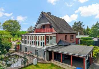 Familienidylle in Wallwitz – Gepflegtes Einfamilienhaus mit Wintergarten, Teich und gepflegten Garten
