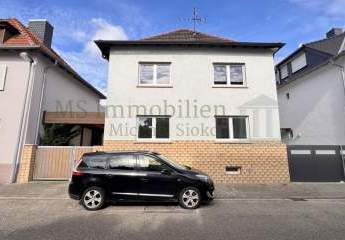 ** Charmantes Einfamilienhaus in zentraler Lage in Lampertheim – viel Platz für die ganze Familie **