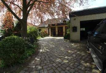 Charmanter Walmdach-Bungalow mit idyllischem Grundstück, Kamin, Garage in ruhiger Lage von Nordholz