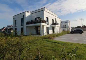 Exquisite Eigentumswohnung in hervorragender Ausführung mit Einbauküche, 2 Terrassen und Stellplatz