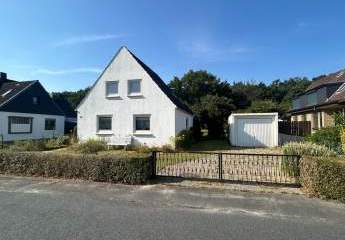Modernisierungsbedürftiges Einfamilienhaus mit großem Grundstück in ruhiger Wohnlage
