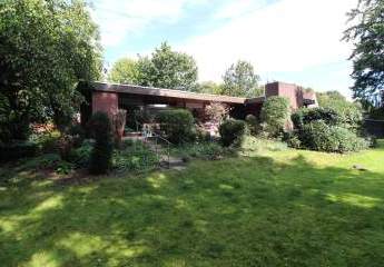 Individueller Flachdach-Bungalow mit Doppelgarage & Parkähnlichem Grundstück in Schiffdorf-Sellstedt