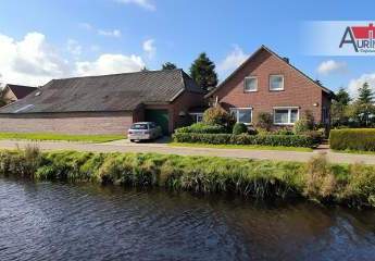 Ehemalige Hofstelle mit Wohnhaus, Scheune u. Bauplatz