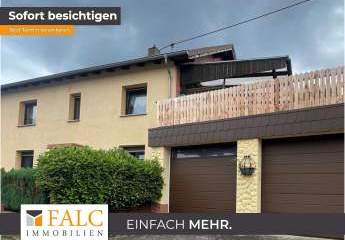Einfamilienhaus in zentraler Lage mit 2 Garagen