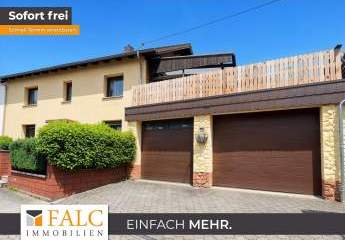 Einfamilienhaus in zentraler Lage mit 2 Garagen