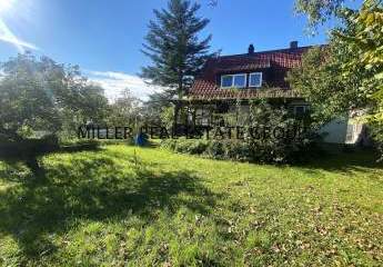 GROßZÜGIGES EINFAMILIENHAUS IN GRÜNER UND IDYLLISCHER LAGE