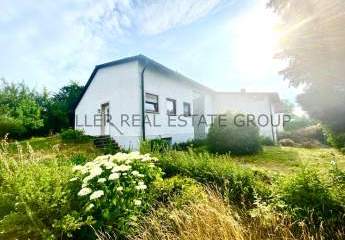 Einfamilienhaus mit großem Grundstück und Ausbaupotenzial!